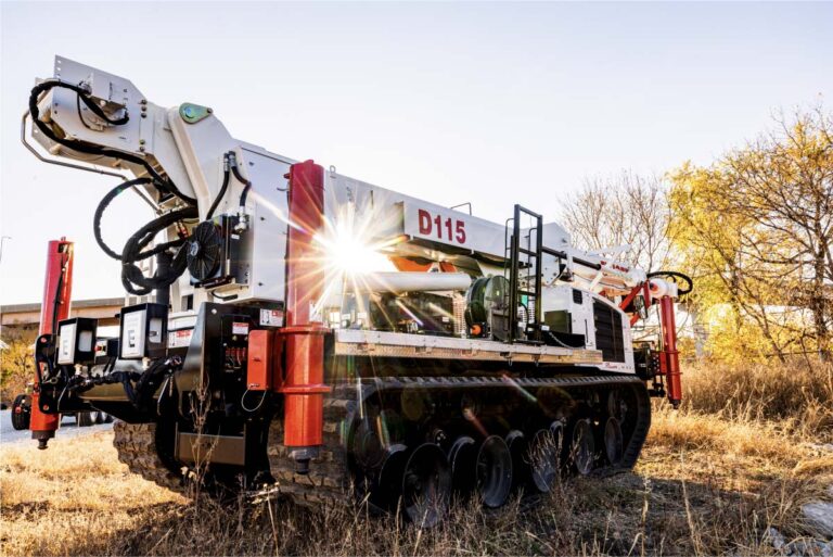 Elliott D115 Digger Derrick in a field