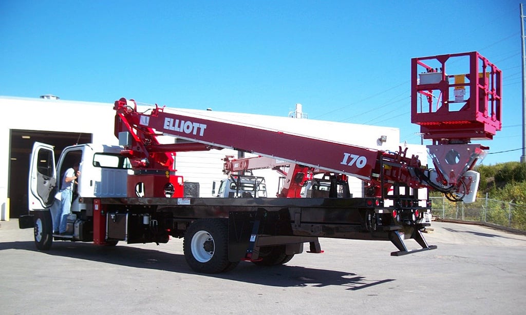 red i 70 truck from back with man stepping into drivers side cab