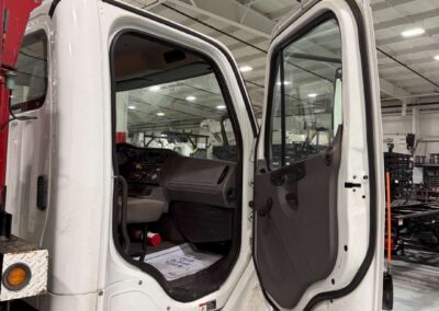 Pre-owned G40 HiReach aerial work platform with the right door open